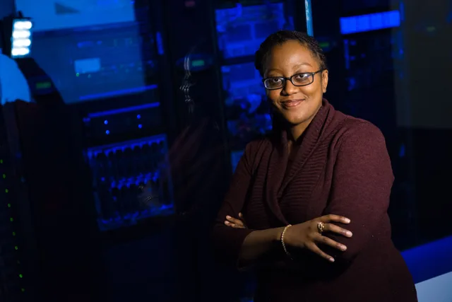 Confident woman in data center, showcasing tech expertise. Decentralized networks have no useful rankings: six questions to ask instead